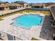 An aerial view of the community pool with surrounding patio and lounge chairs at 8405 Sw 59Th Ter, Ocala, FL 34476