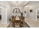 Farmhouse-style dining room with a large wooden table at 8405 Sw 59Th Ter, Ocala, FL 34476