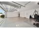 Clean and spacious garage with high ceilings and epoxy flooring at 8405 Sw 59Th Ter, Ocala, FL 34476