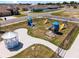 Aerial view of a playground with play structures, swings and gazebo at 8405 Sw 59Th Ter, Ocala, FL 34476