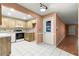 Kitchen offers ample cabinetry and a view into the hallway at 8637 Sw 97Th Lane Rd # A, Ocala, FL 34481