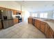 Kitchen with stainless steel appliances and wood cabinets at 8697 Se 136Th Ln, Summerfield, FL 34491