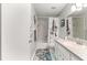 Simple bathroom with bathtub, shower, and vanity at 8738 Sw 90Th St # B, Ocala, FL 34481