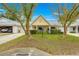 House exterior with driveway and landscaping at 8738 Sw 90Th St # B, Ocala, FL 34481