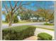 Serene view of a tree-lined street from the porch at 8738 Sw 90Th St # B, Ocala, FL 34481