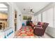 Living room with brown leather couches and colorful rug at 8738 Sw 90Th St # B, Ocala, FL 34481