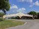 The Villages entrance features a decorative arch bridge at 8990 Se 178Th Muirfield Pl, The Villages, FL 32162