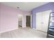 Large bedroom with two-toned walls and wood floors at 9181 Sw 49Th Ct, Ocala, FL 34476