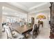 Elegant dining room featuring a wood table and comfortable seating at 9181 Sw 49Th Ct, Ocala, FL 34476