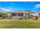 View of backyard, patio, and landscaping at 9470 Sw 66Th Loop, Ocala, FL 34481