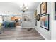 Elegant dining room with hardwood floors and gallery wall at 9470 Sw 66Th Loop, Ocala, FL 34481