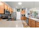 Updated kitchen featuring stainless steel appliances and wood cabinetry at 9470 Sw 66Th Loop, Ocala, FL 34481