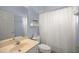 Clean bathroom with a shower/tub combo and vanity at 9554 Sw 93Rd Loop, Ocala, FL 34481