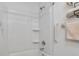 Simple bathroom with shower/tub and built-in shelving at 9802 Sw 88Th Ter # A, Ocala, FL 34481