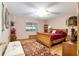 Bedroom with wood furniture and area rug at 9802 Sw 88Th Ter # A, Ocala, FL 34481