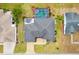 Aerial view of house, pool, and landscaping at 9836 Se 175Th Pl, Summerfield, FL 34491