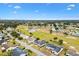 Aerial view showcasing home's location in golf community at 9836 Se 175Th Pl, Summerfield, FL 34491