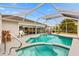 Screened pool and spa with golf course view at 9836 Se 175Th Pl, Summerfield, FL 34491