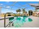 Screened pool and spa with golf course view at 9836 Se 175Th Pl, Summerfield, FL 34491