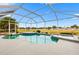 Screened pool and spa with golf course view at 9836 Se 175Th Pl, Summerfield, FL 34491