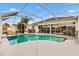 Screened pool and spa with golf course view at 9836 Se 175Th Pl, Summerfield, FL 34491