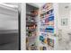 Well-organized pantry with adjustable shelving at 9945 Sw 100Th Terrace Rd, Ocala, FL 34481