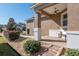 Covered porch with brick walkway and landscaping at 9945 Sw 100Th Terrace Rd, Ocala, FL 34481