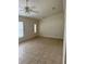 Spacious living room with tile flooring and ceiling fan at 1 Hemlock Circle Way, Ocala, FL 34472