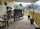 Inviting outdoor patio with seating and grill area at 10800 Sw 62Nd Ave, Ocala, FL 34476