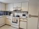 Well-equipped kitchen with ample cabinetry and modern appliances at 10800 Sw 62Nd Ave, Ocala, FL 34476