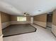 Living room featuring neutral colored carpeting and tile flooring at 10895 Sw 90Th Ter, Ocala, FL 34481