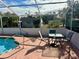 Screened pool and patio furniture at 10895 Sw 90Th Ter, Ocala, FL 34481