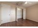 Bedroom with wood floors and large closet at 10918 Se 50 Ave, Belleview, FL 34420