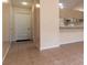 View of entryway with tile floor and access to other rooms at 10918 Se 50 Ave, Belleview, FL 34420