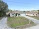 Aerial view of house and front yard at 13165 Sw 107Th St, Dunnellon, FL 34432