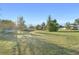 Expansive backyard with mature trees and boat at 13165 Sw 107Th St, Dunnellon, FL 34432