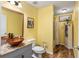 Bathroom with a copper sink and a shower/tub combo at 13165 Sw 107Th St, Dunnellon, FL 34432