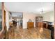 Wood floors in the entryway that leads to the living room and kitchen at 13165 Sw 107Th St, Dunnellon, FL 34432