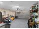 Spacious garage with ample storage shelving at 13165 Sw 107Th St, Dunnellon, FL 34432