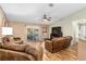 Relaxing living room with hardwood floors, fireplace, and sliding doors at 13165 Sw 107Th St, Dunnellon, FL 34432