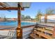 Inviting above-ground pool with wooden deck and pergola at 13165 Sw 107Th St, Dunnellon, FL 34432