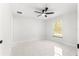 Well-lit bedroom with ceiling fan and large window at 14108 Se 42Nd Ter, Summerfield, FL 34491