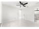 Bright bedroom with ceiling fan and marble floors at 14108 Se 42Nd Ter, Summerfield, FL 34491