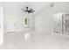 Open living area with marble floors and access to entryway at 14108 Se 42Nd Ter, Summerfield, FL 34491