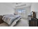 Spacious bedroom with large window and ample closet space at 1789 Usrey Ct, Okahumpka, FL 34762