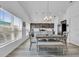 Dining area with farmhouse style table and bench seating at 1789 Usrey Ct, Okahumpka, FL 34762