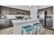 Modern kitchen with stainless steel appliances and island at 1789 Usrey Ct, Okahumpka, FL 34762