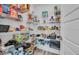 Well-organized pantry with ample shelving for storage at 1789 Usrey Ct, Okahumpka, FL 34762