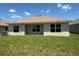 The house boasts a well-kept backyard that is perfect for Gathering gatherings and outdoor entertainment at 2154 Nw 23Rd Loop, Ocala, FL 34475