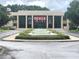 Exterior view of the Appleton Museum featuring a modern facade and a tranquil water feature in front at 2154 Nw 23Rd Loop, Ocala, FL 34475